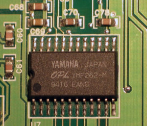 Photograph of the YMF262-M audio processor widely used in sound cards of the 1990's